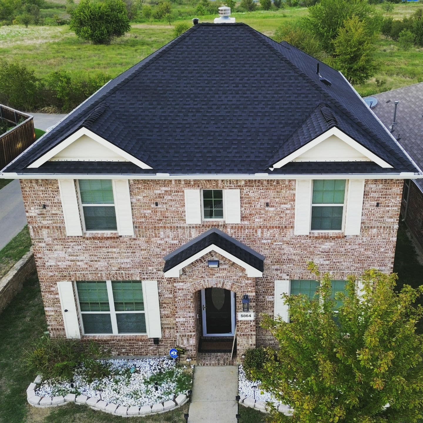 Stunning Two-Story Roof Installation image